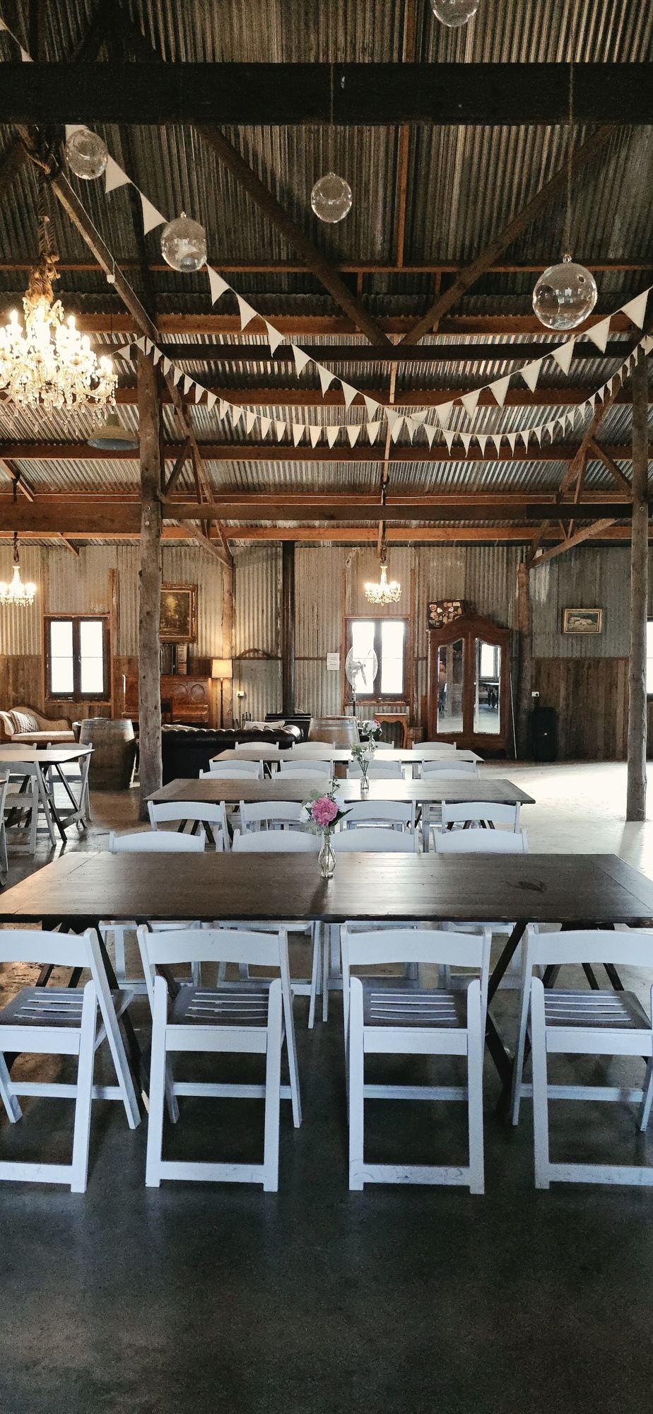Long trestle tables ready for styling