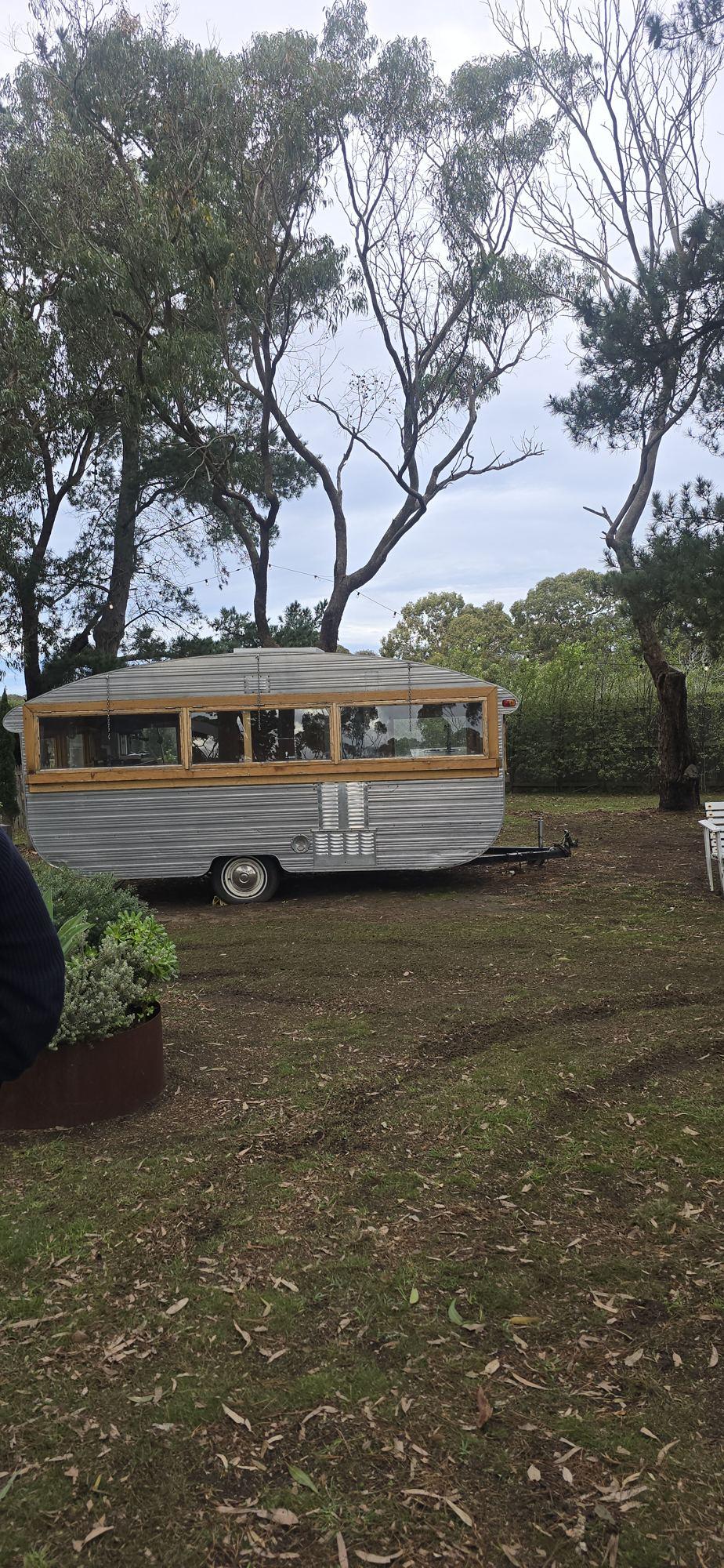 The gardens and caravan bar at Ivory Barn